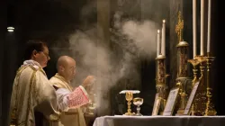 Priest celebrating the traditional Latin Mass at the church of St Pancratius, Rome. Thoom/Shutterstock